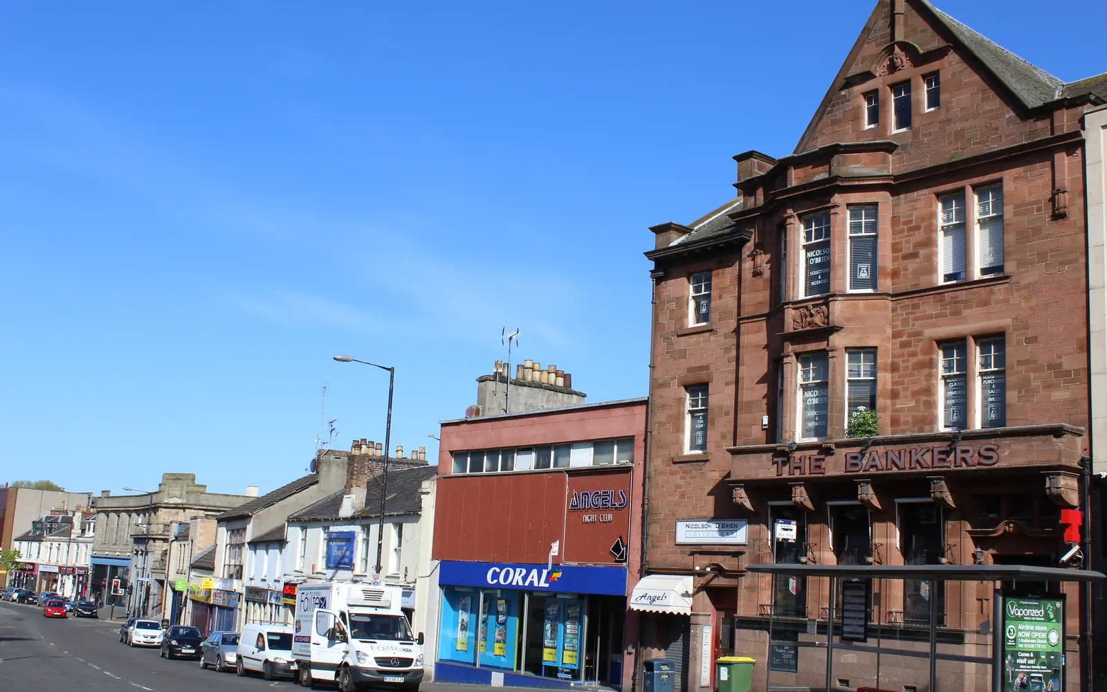 Red sandstone buildings on Stirling Street in Airdrie town centre