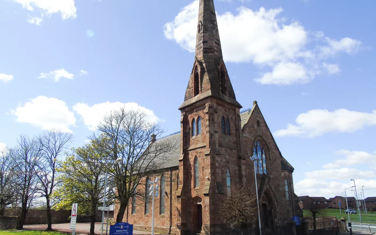 Bellshill West Church under a blue sky